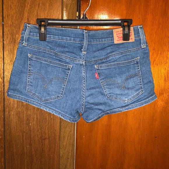Levi’s medium colored denim jean shorts - Picture 2 of 2
